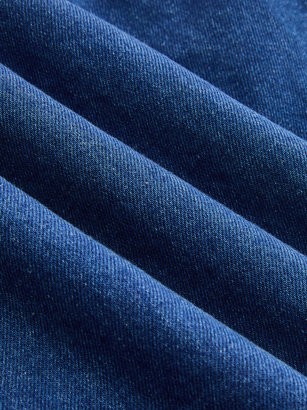 Mini-robe en jean sans manches à dos ouvert